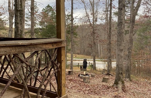 Gray Hawk Cabin | Nestled in woods a stone's throw from Daniel Boone Forest and 600 mi of trails .