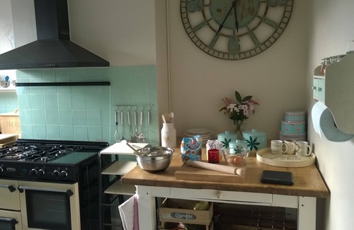 Swanage Apartment | Nestleton: Breakfast on the balcony or snuggle around the fire-dogs welcome too