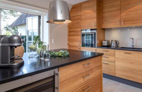 Keitum House | NEU Ferienhaus Friesenhof Aenne Haus 3 - modern urlauben unter Reet in Keitum Sylt