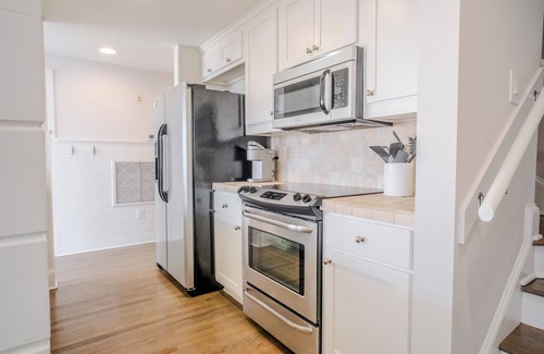 Sunnyside Condo | NEW! Coastal Chic 2BR Condo in Carillon. Pools, Pickleball, Beach Chairs & Wagon