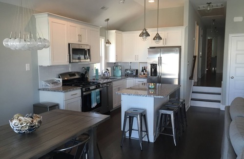 North End House | New construction in 2016. Top floor unit, 3 decks, walk to beach