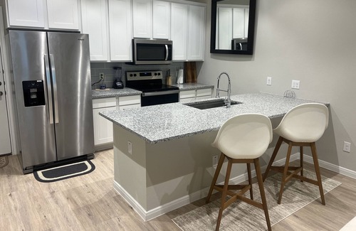 Barker House | New cozy Katy home! 3 Bed-2.5 bath, Hot tub, Karaoke Mic, relaxing fireplace.