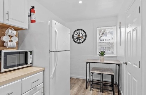Laconia Apartment | NEW! Cozy & Modern unit w/Private HOT TUB and Backyard