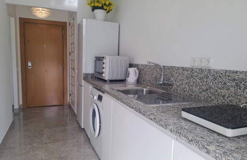 Caleta de Velez Apartment | NEW Firstline Beach, Sea View, Aircon, fast WiFi, Pool, 2 Sunny Terraces Parking