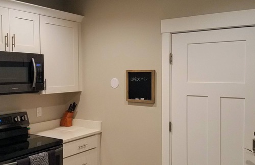 Riverton House | New, fresh and modern day light basement apartment with private entrance