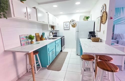 Yeoman Wood Apartment | NEW Fresh Lagoon Blue Beachfront Studio at Coral Beach Hotel, Grand Bahama