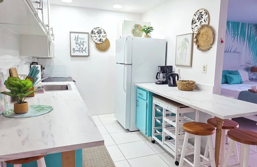 Yeoman Wood Apartment | NEW Fresh Lagoon Blue Beachfront Studio at Coral Beach Hotel, Grand Bahama