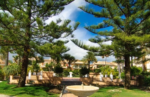 New Golden Mile Cottage | New Golden Mile beach townhouse with garden and BBQ