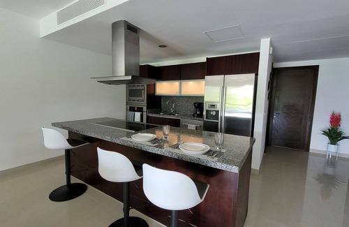 Puerto Juarez Condo | New Listing! Beautiful Condo with accesss to private beach