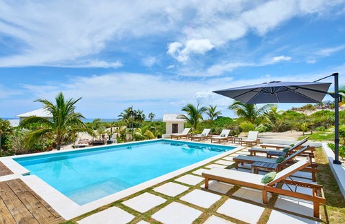 Governor's Harbour House | New Luxury Beachfront Bungalows w/Heated Pool, Pink-Sand Beach