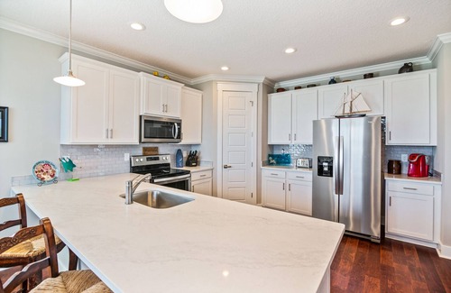 Butler Beach House | New Luxury Beach House with Stunning Views, Balconies and elevator