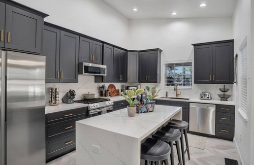 Flagstaff House | NEW! Modern Mountain 4BR with hot tub, AC, Game Room and EV & Tesla Charger