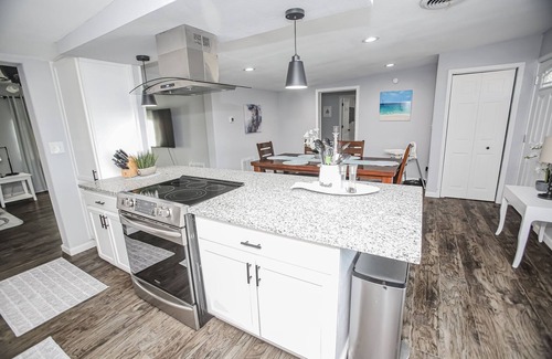 Cedar Lane House | NEW to VRBO! Minutes to the beach! Family-sized Home w/creek views & fishing!