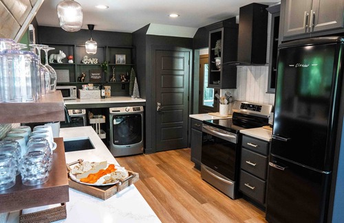 Helen Cabin | New Upscale Rustic A-frame cabin sitting on golf course