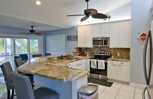 Venetian Shores Villa | NewBeautifulCanal Home Snake Creek with Bay&Ocean Access Tiki&Pool 100ft Dockage
