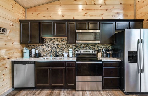Sevierville Cabin | Newly Built Cabin! Hot Tub! Foosball! 5 MI to Pigeon Forge! Mountain Views!