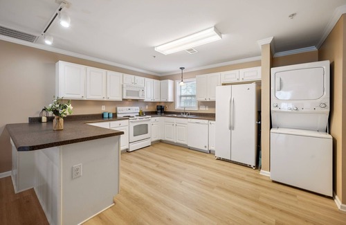 White Lake House | Newly Furnished! Relax in style in this charming townhome in gated community