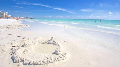 Siesta Key Apartment | Newly remodeled 8-steps to sand path of Beach!