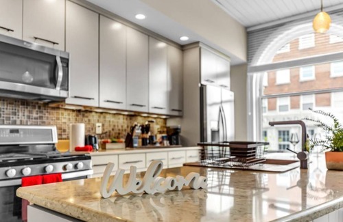 Downtown Greensboro Condo | Newly remodeled penthouse suite with city view! Spacious open layout! Walking distance to must-see attractions! Private deck! Free high-speed Internet!