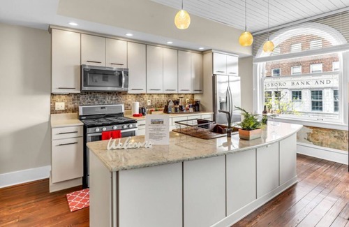 Downtown Greensboro Condo | Newly remodeled penthouse suite with city view! Spacious open layout! Walking distance to must-see attractions! Private deck! Free high-speed Internet!