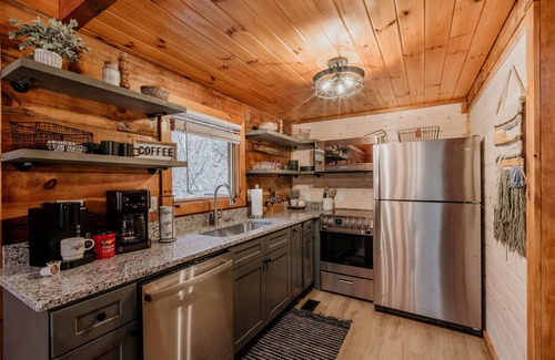 Sevierville Cabin | Newly renovated cozy cabin with a waterfall view. Easy access.