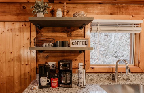 Sevierville Cabin | Newly renovated cozy cabin with a waterfall view. Easy access.
