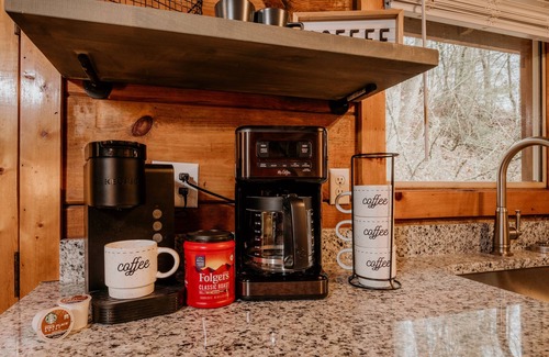 Sevierville Cabin | Newly renovated cozy cabin with a waterfall view. Easy access.