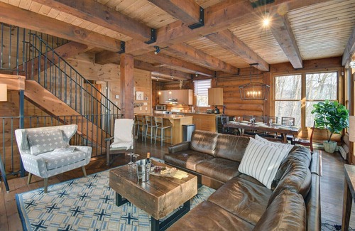 Lac Superieur Village Ski Chalet | Newly renovated log home with private spa and lake access.