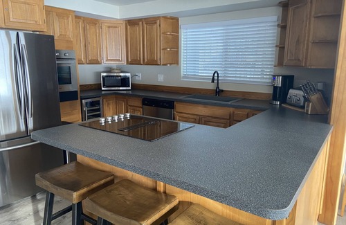 Coeur d'Alene House | Newly renovated Lakehouse on Rockford Bay, private beach, walk to Shooters