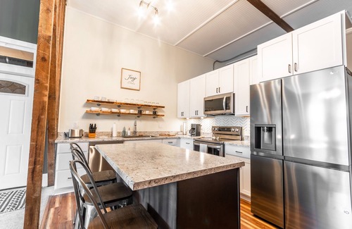 Logan Apartment | Newly renovated upstairs apartment in historic downtown Logan!