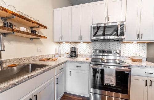 Logan Apartment | Newly renovated upstairs apartment in historic downtown Logan!