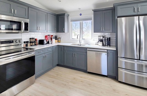 Silver Beach House | Newly Renovated 3BD-Central A/C, Enclosed Outdoor Shower, Bike or Walk to New Silver Beach, Only 0.5 Mi