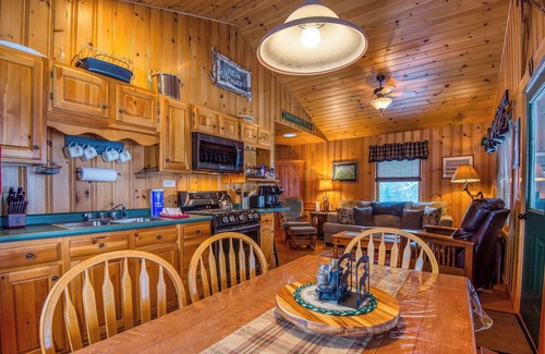 Rangeley Plantation Cabin | Niboban Cabin 5 right on Rangeley Lake with a screened porch, fire pit, hammock, WiFi and dock!