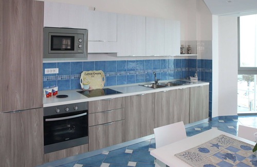 Latina Lido Apartment | Nice apartment for 5 guests with A/C, WIFI, pool, TV, balcony, pets allowed and parking