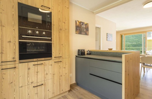Bianzone House | Nice apartment in villa for 8 guests with A/C, WIFI, TV, terrace and pets allowed