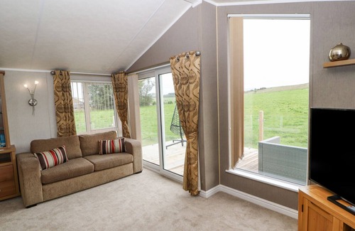 Cockermouth Cottage | NO.8 HILLCOTE LODGE, pet friendly in Aspatria