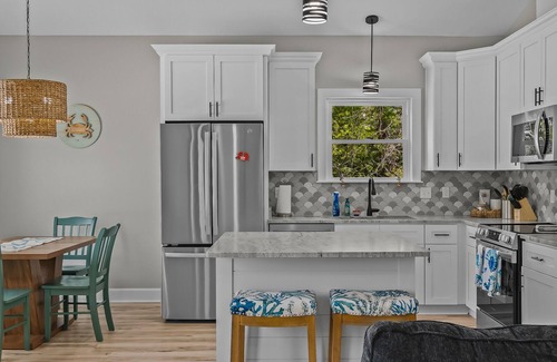 Carrabelle House | No Wake Zone – Drift In, Slow Down, Stay Awhile.