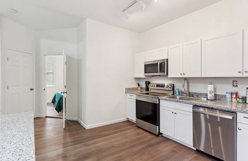Tulane - Gravier House | NOLA Chic 5BR Retreat w/Hot Tub in the City