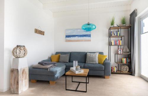 Busum House | NordseeResort Büsum Ferienhaus 15 Dat Verhaal