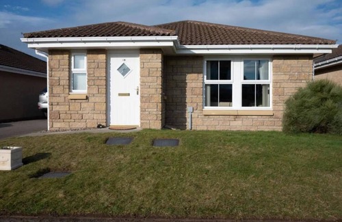 Nairn House | nStylish property with enclosed garden, parking and two minutes to the Golf Club