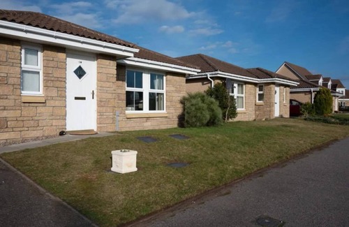 Nairn House | nStylish property with enclosed garden, parking and two minutes to the Golf Club