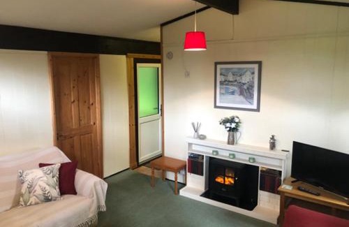 Cenarth House | Nuthatch Lodge is set in 24 acres of wood, parkland near the village of Cenarth