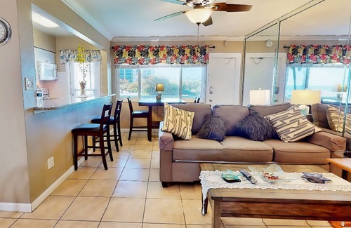 Satellite Beach Apartment | Ocean front apartment with pool, firepit, TV, & beach gear - snowbird friendly