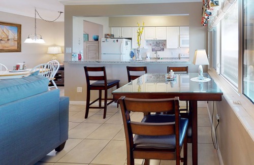 Satellite Beach Apartment | Ocean front apartment with pool, firepit, TV, & beach gear - snowbird friendly