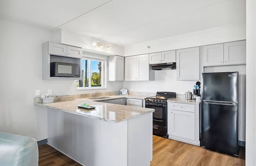 Fort Bay House | Ocean/Gulf View Beach Walkup Emerald Suite at Sugar Sands Beachfront Hotel