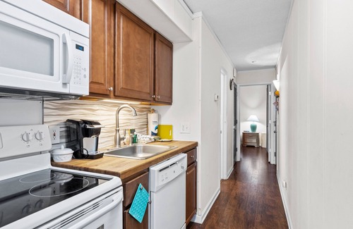 Morehead City Condo | Ocean view condo in beachfront complex with pools, tennis & beach gear