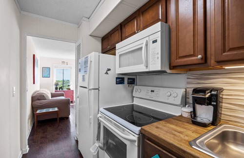 Morehead City Condo | Ocean view condo in beachfront complex with pools, tennis & beach gear
