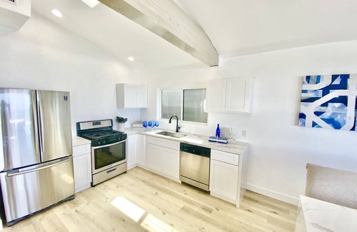 South Oceanside House | Oceanfront Beach House, Fire Ring in Sand, Panoramic Doors, Walk to Dining