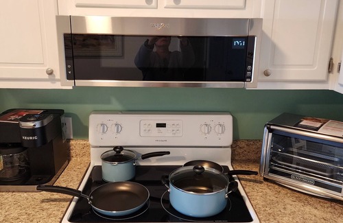 Morehead City Condo | Oceanfront complex, two pools, beach access, and king bed!