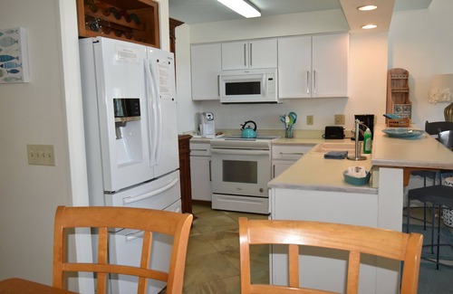 Kure Beach Condo | Oceanfront first floor condo with large deck. Indoor and Outdoor pools.